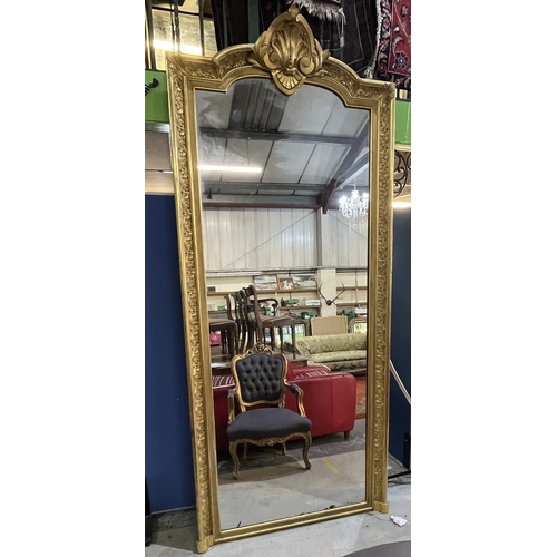 1296 - Large 19th century pier mirror rectangular plate in Gothic arch and scroll moulded giltwood and gess... 