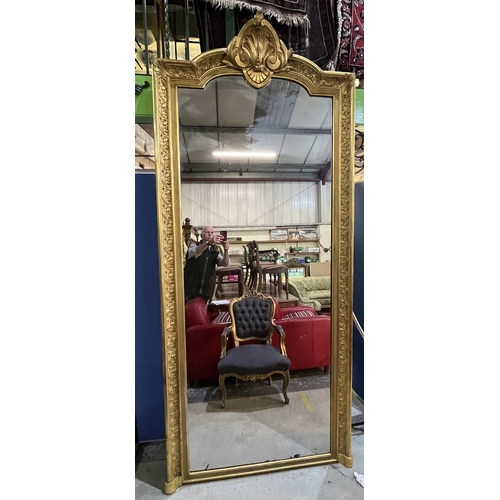 1296 - Large 19th century pier mirror rectangular plate in Gothic arch and scroll moulded giltwood and gess... 