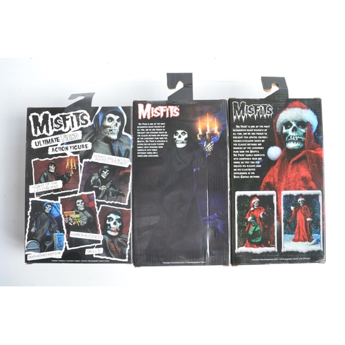 68 - Three boxed Misfits 8