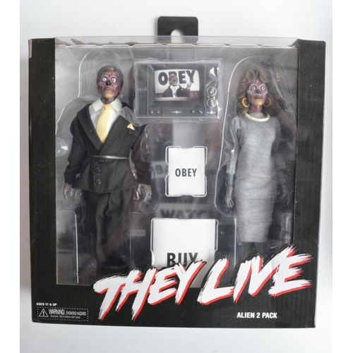 69 - Two boxed 'They Live' 8