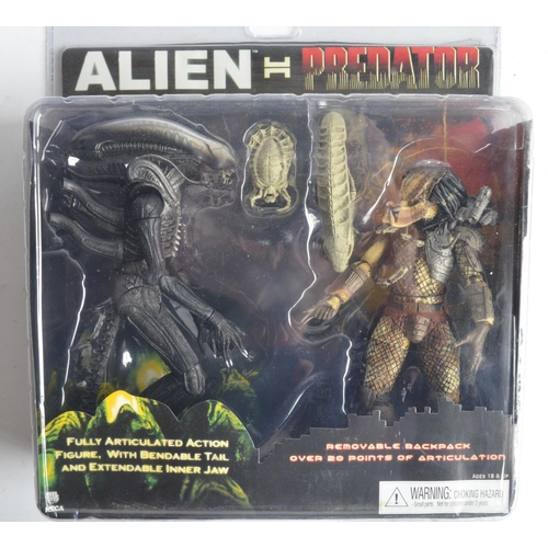 78A - Two Alien vs Predator action figure sets from Neca to include two figure Predator/Alien set and sing... 