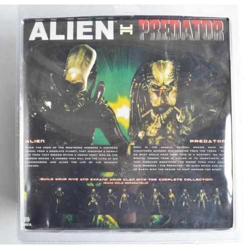 78A - Two Alien vs Predator action figure sets from Neca to include two figure Predator/Alien set and sing... 