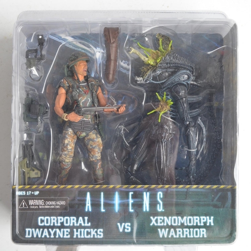 83 - Two multi figure Aliens 7