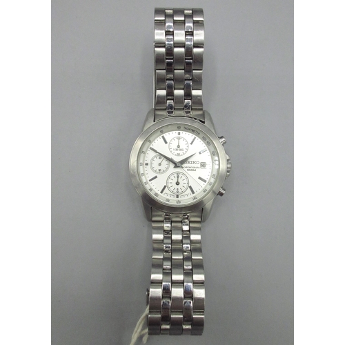 Seiko 1/20th second stainless steel quartz chronograph wristwatch with date, signed silvered dial baton hour indices, three subsidiary dials, signed screw off case back, movement ref. 7T92, case ref. 0LH0, serial no. 066455, D40.9mm
