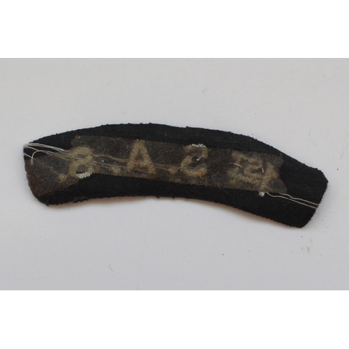 1220 - Large collection of military metal and cloth badges. 1st S.A.S Shoulder Title, R.A.F. Pilots Wings, ... 