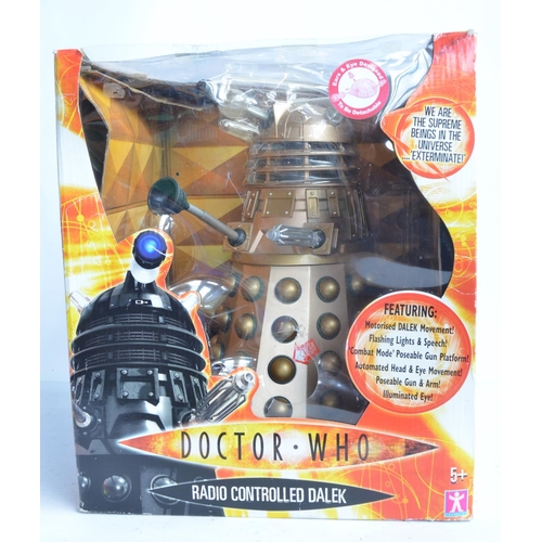 123 - Two large boxed radio controlled Dalek models from Character (larger example previously used but re-... 