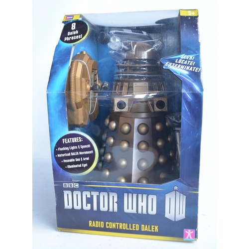 123 - Two large boxed radio controlled Dalek models from Character (larger example previously used but re-... 