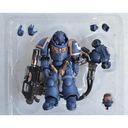 134 - Six JoyToy Warhammer 40,000 Ultramarines 1/18 scale action figures to include Primaris Company Champ... 