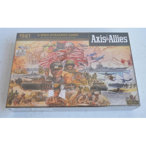 140 - Four boxed strategy based board games to include an as new/factory sealed Avalon Hill Axis & Allies ... 