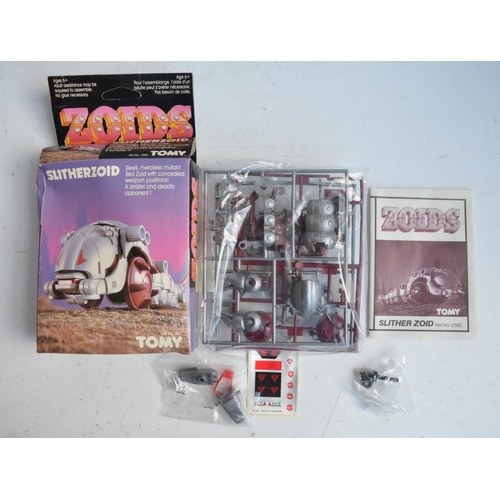 143 - Collection of vintage Tomy Zoids to include a boxed Gore The Lord Protector (with instruction manual... 