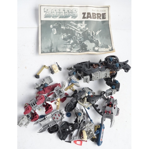 143 - Collection of vintage Tomy Zoids to include a boxed Gore The Lord Protector (with instruction manual... 