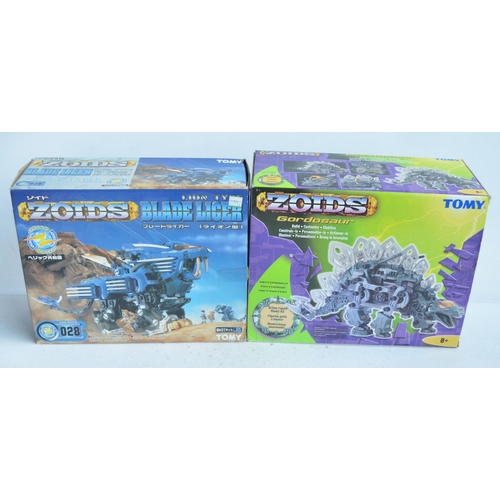 145 - Two boxed modern Zoids from Tomy to include Gordosaurus and Blade Liger, both models started but not... 