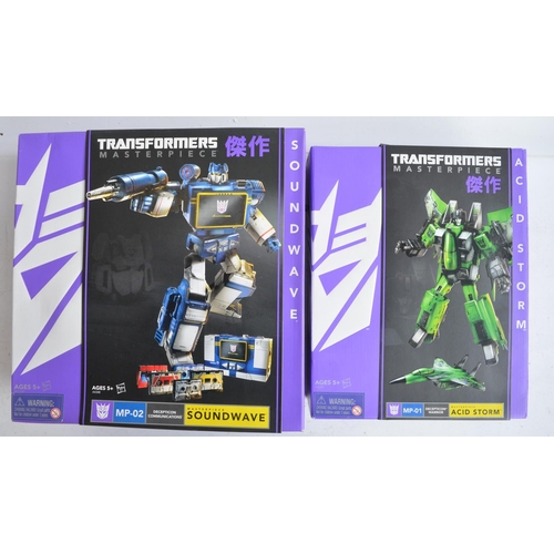 155 - Two large Hasbro Transformers Collectors Club Masterpiece models to include MP-01 Decepticon Warrior... 