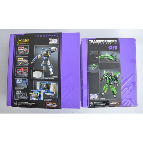 155 - Two large Hasbro Transformers Collectors Club Masterpiece models to include MP-01 Decepticon Warrior... 