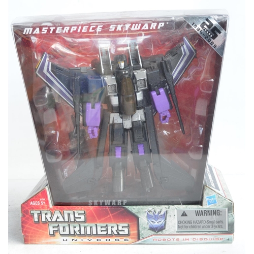 166 - Four Transformer models from Hasbro to include Silver Knight Optimus Prime (approx 8.5