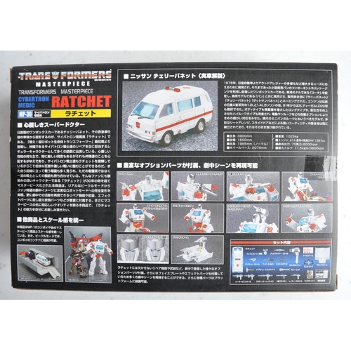 169 - Three unopened/factory sealed vehicle mode Transformers Masterpiece models from Takara Tomy to inclu... 