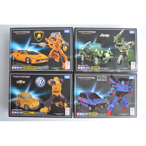 170 - Four car mode Transformers Masterpiece models from Takara Tomy to include MP-39 Sunstreaker, MP-47 H... 