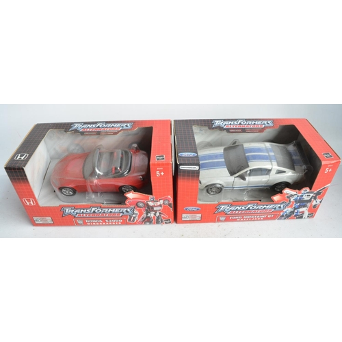 175 - Six Hasbro 1/24th scale Transformers Alternators car themed models to include unopened/factory seale... 