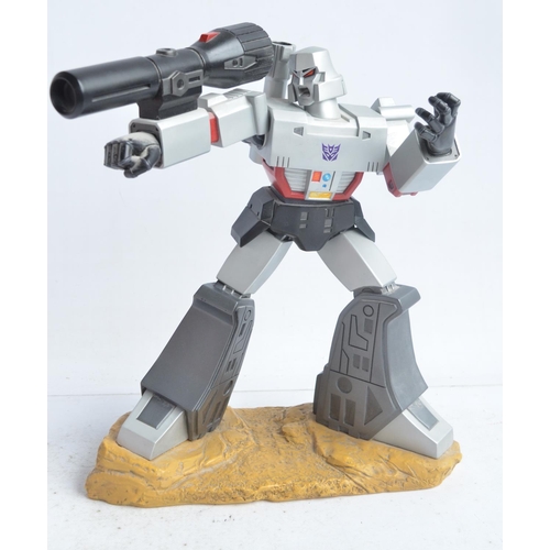 179 - Large cold cast porcelain G1 Megatron Transformers statue (stands approx 12.5