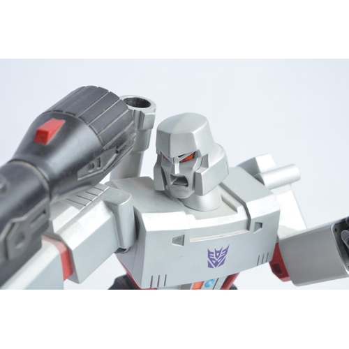 179 - Large cold cast porcelain G1 Megatron Transformers statue (stands approx 12.5