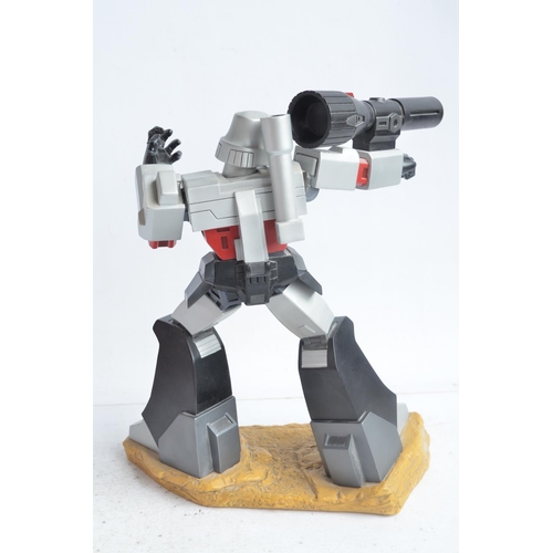 179 - Large cold cast porcelain G1 Megatron Transformers statue (stands approx 12.5