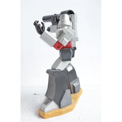 179 - Large cold cast porcelain G1 Megatron Transformers statue (stands approx 12.5