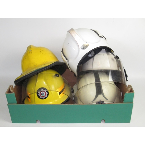 1288 - Five British vintage firefighter helmets of various styles and eras, including a c1990 Cromwell 'Fir... 