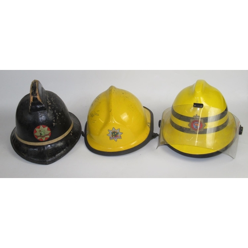 1290 - Five British vintage firefighter helmets of various styles and eras, including a WWII Street Fire Pa... 