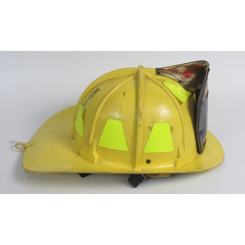 1296 - C1980s Cairns and Bro helmet, with original lining and 'Engine 3 Lincoln' shield