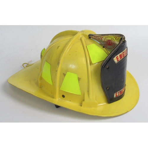 1296 - C1980s Cairns and Bro helmet, with original lining and 'Engine 3 Lincoln' shield