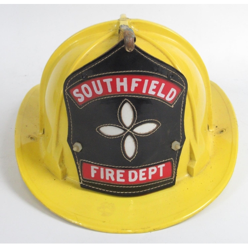 1297 - C1980s Cairns and Bro helmet, with original lining and 'Southfield Fire Department' shield