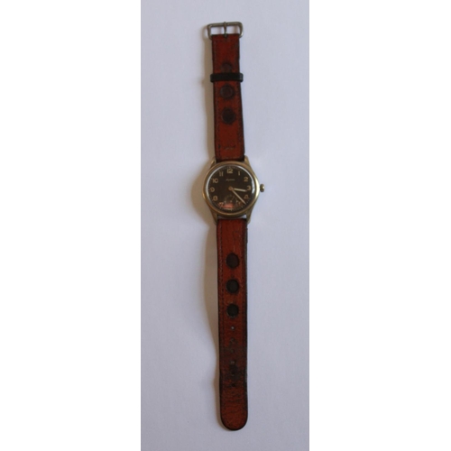 1252 - Alpina 592 Luftwaffe pilots wrist watch. Brass case and steel back. Black face, with subsidiary seco... 