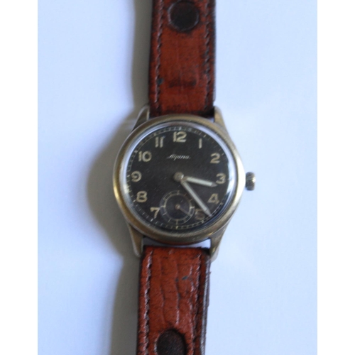 1252 - Alpina 592 Luftwaffe pilots wrist watch. Brass case and steel back. Black face, with subsidiary seco... 