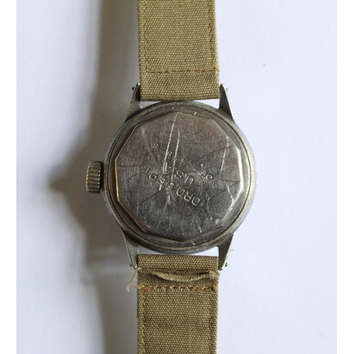 1254 - Elgin 539 15 jewel U.S. Ordinance department wrist watch. Steel case and back. Subsidiary second han... 