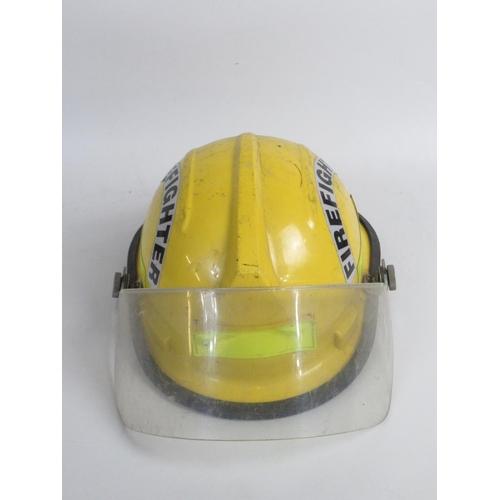 1301 - C1987 Bullard FH2100 helmet and a c1991 Cairns and Bro 990 'Crew Chief' helmet