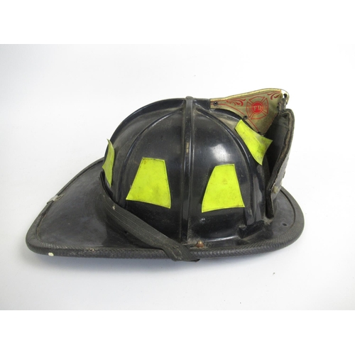 1303 - C1980s Cairns and Bro 880 pattern helmet, with original lining and 'NFD 21 117' leather shield