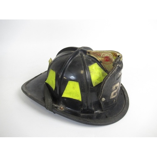 1303 - C1980s Cairns and Bro 880 pattern helmet, with original lining and 'NFD 21 117' leather shield