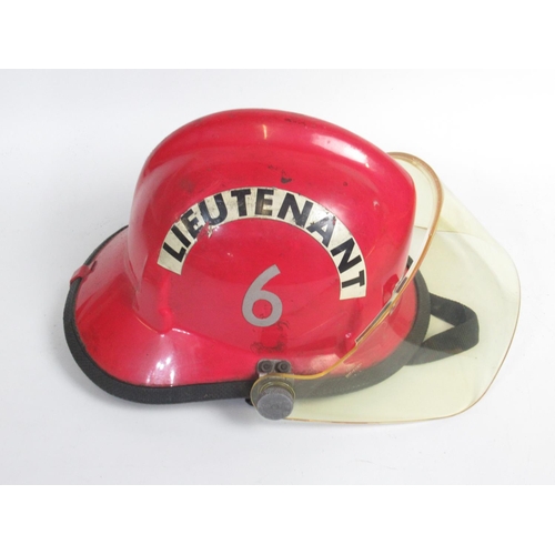 1304 - Three vintage American Fireman helmets, including a c1987 Bullard Poss USAF helmet, a c1990s Cairns ... 