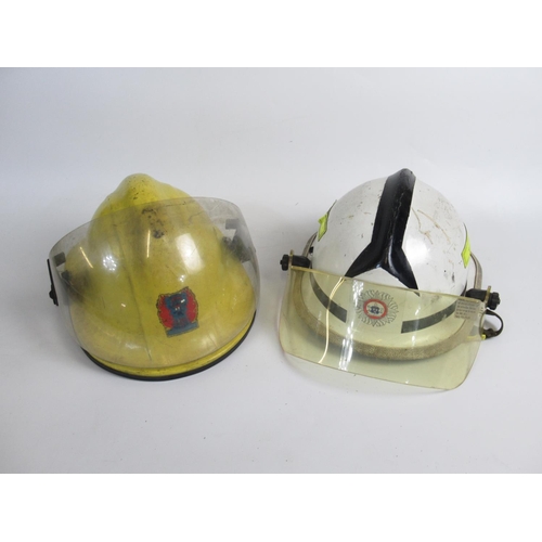 1305 - Five Irish vintage firefighter helmets of various styles and eras, including a c1994 Cairns and Bro ... 