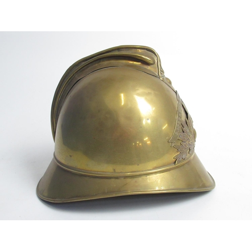 1308 - Early C20th Adrian pattern brass French fireman helmet with Laon Fire Brigade shield