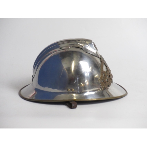 1309 - C20th Adrian pattern chrome-plated French fireman helmet with original lining and Lumbres Fire Briga... 