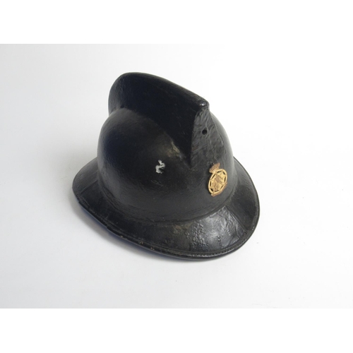 1311 - C1940s Levoir Cork helmet with original lining and a WWII Belgian Civil Defence Force badge