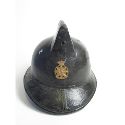 1311 - C1940s Levoir Cork helmet with original lining and a WWII Belgian Civil Defence Force badge