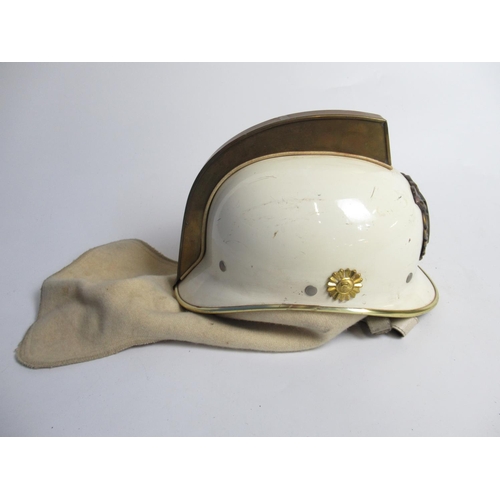 1312 - Two C1950s Dutch brass and plastic Fireman helmets, including one from Haarlem, and a C1980s Dutch p... 