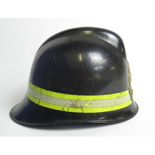 1314 - 1972 MISPA plastic helmet with Italian firefighter badge