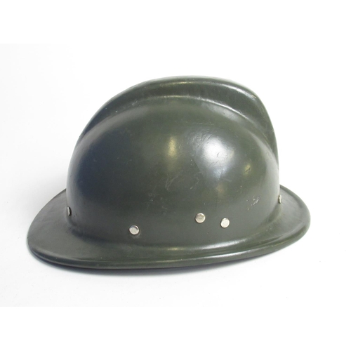 1317 - C1970s Soviet Fire Service steel helmet and a C1980s Romanian Fire Service helmet, both with lining