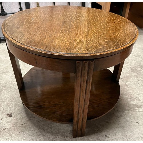 615 - 20th century 'Fyne Ladye' oak coffee table, circular swivel top on moulded supports with undertier, ... 