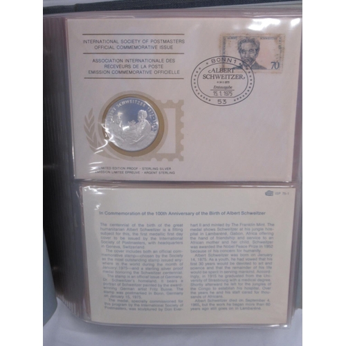 598 - International Society of Postmasters Official Commemorative Issues folder cont. 36 Sterling Silver M... 