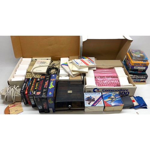 1054 - Two boxed Commodore Amiga computer systems including model 500 and 600, two navigator controllers, l... 