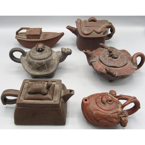 1047 - Six Chinese Yixing clay teapots, rectangular tapered teapot with tortoise cover, lotus flower teapot... 